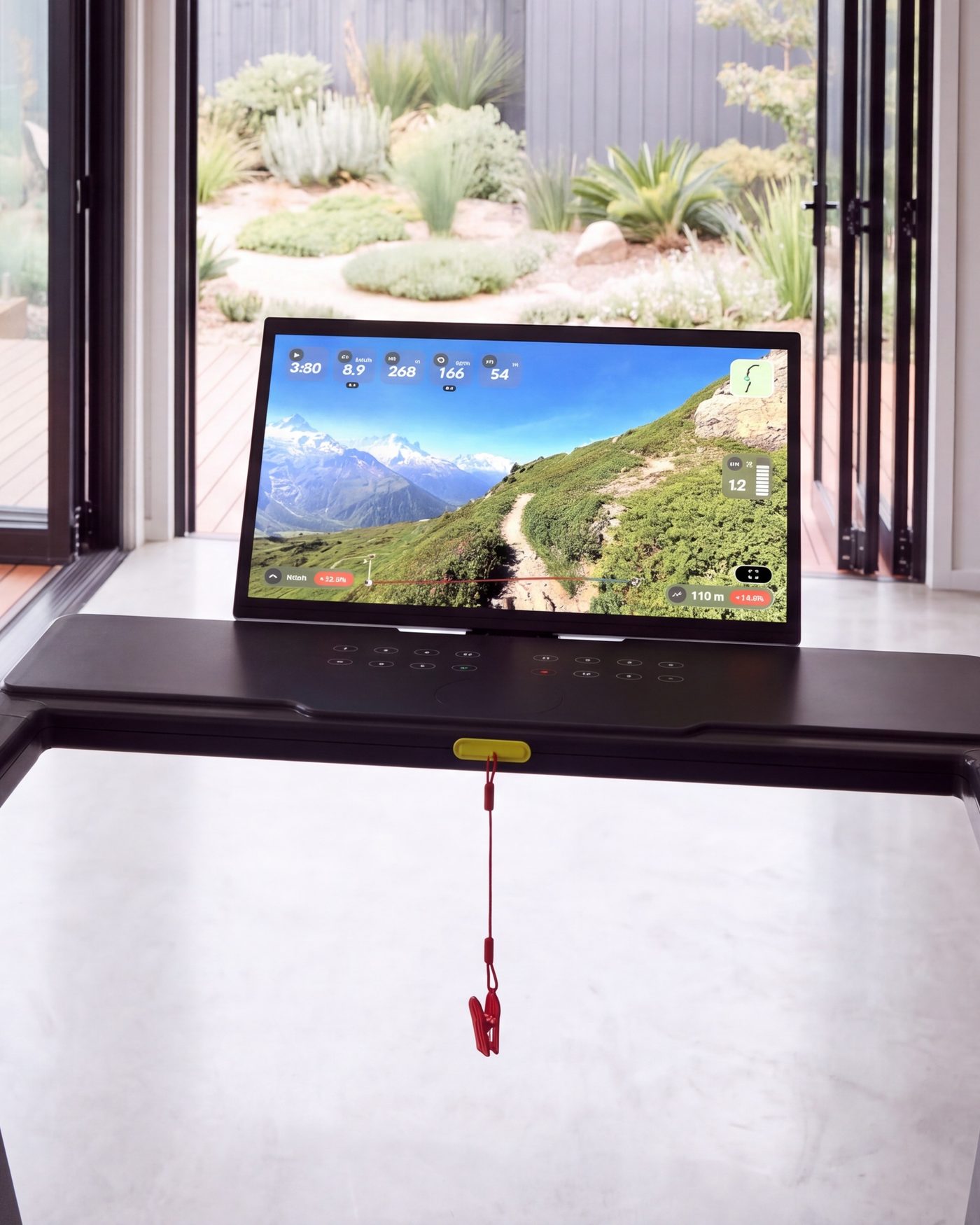 A Kinomap route on the ON:PACE KAZE 7 touchscreen, by a garden